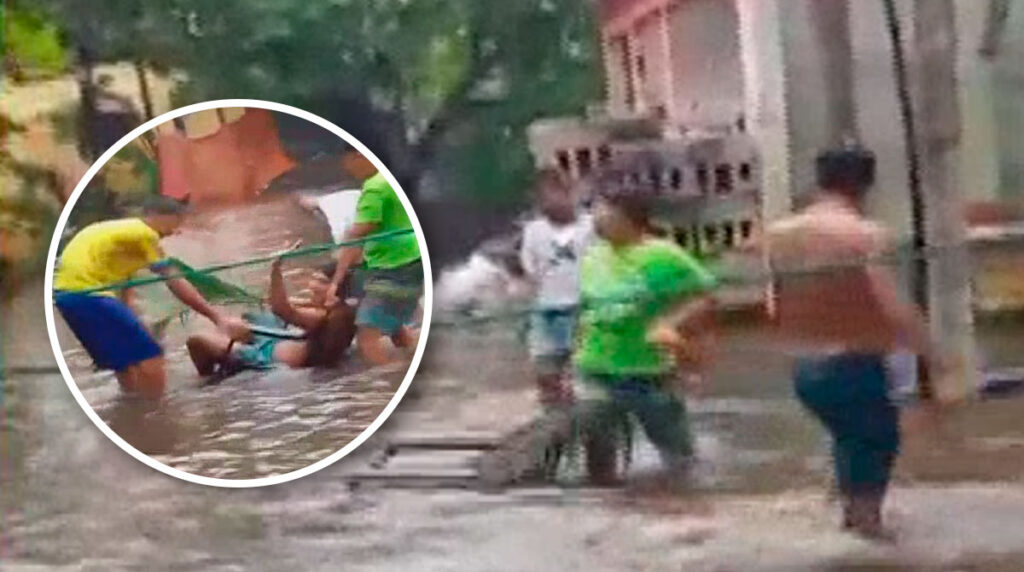 ninos-aprovechan-inundacion-barrio-san-miguel-escuintla-para-divertirse