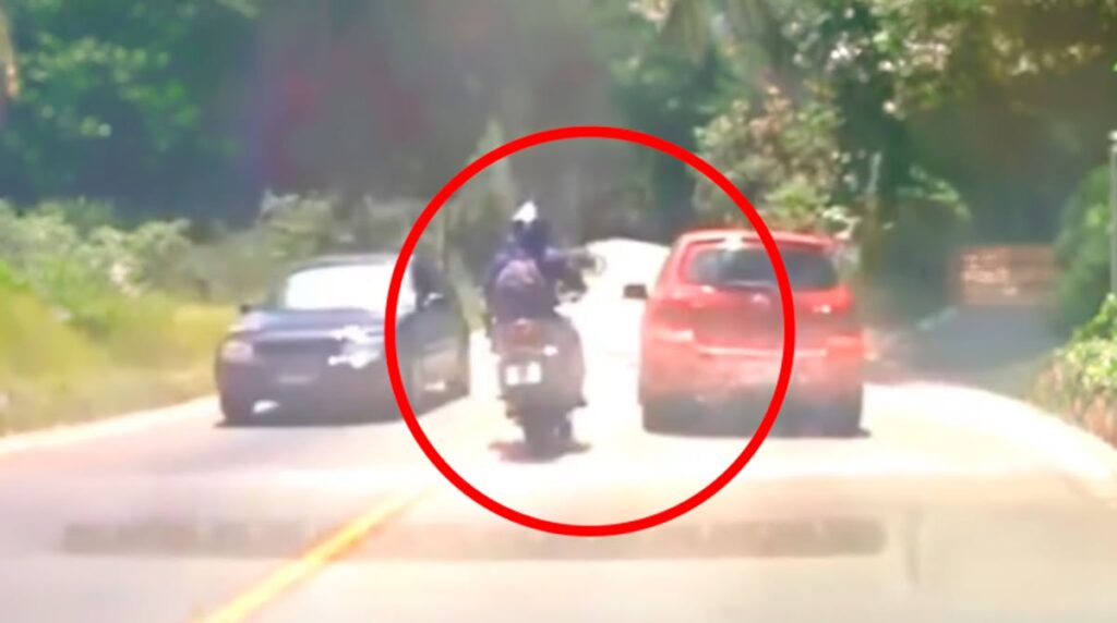 automovilista-a-punto-de-colisionar-contra-motorista-ruta-ciudad-quetzal-video